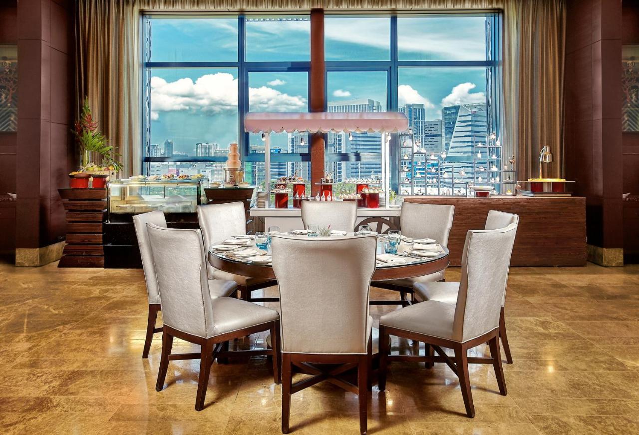 Crimson Hotel Filinvest City, Manila Muntinlupa City Zewnętrze zdjęcie The dining room